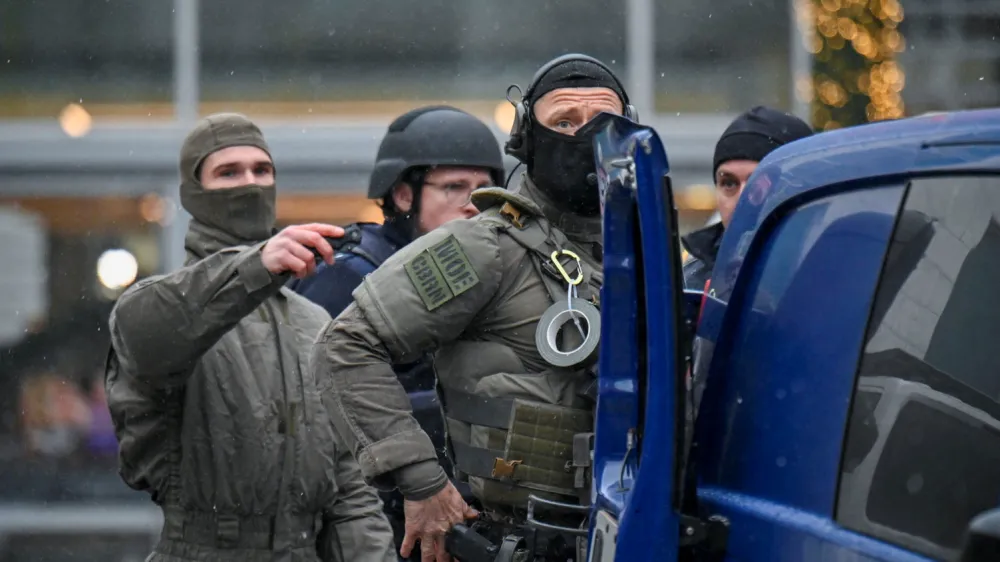 Security forces secure the area at a Christmas market in Dresden, Germany, December 10, 2022. REUTERS/Matthias Rietschel