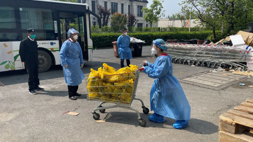 Zhang Wei, store manager of the Xujing branch of Carrefour hypermarket, works at the store following the coronavirus disease (COVID-19) outbreak in Shanghai, China, in this undated handout picture provided to Reuters April 20, 2022. Lu Sunping/Carrefour/Handout via REUTERS ATTENTION EDITORS - THIS IMAGE WAS PROVIDED BY A THIRD PARTY. NO RESALES. NO ARCHIVES.