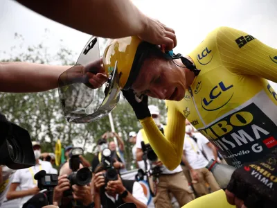 Cycling - Tour de France - Stage 16 - Passy to Combloux - France - July 18, 2023 Team Jumbo–Visma's Jonas Vingegaard wearing the yellow jersey after winning stage 16 Pool via REUTERS/Anne-Christine Poujoulat