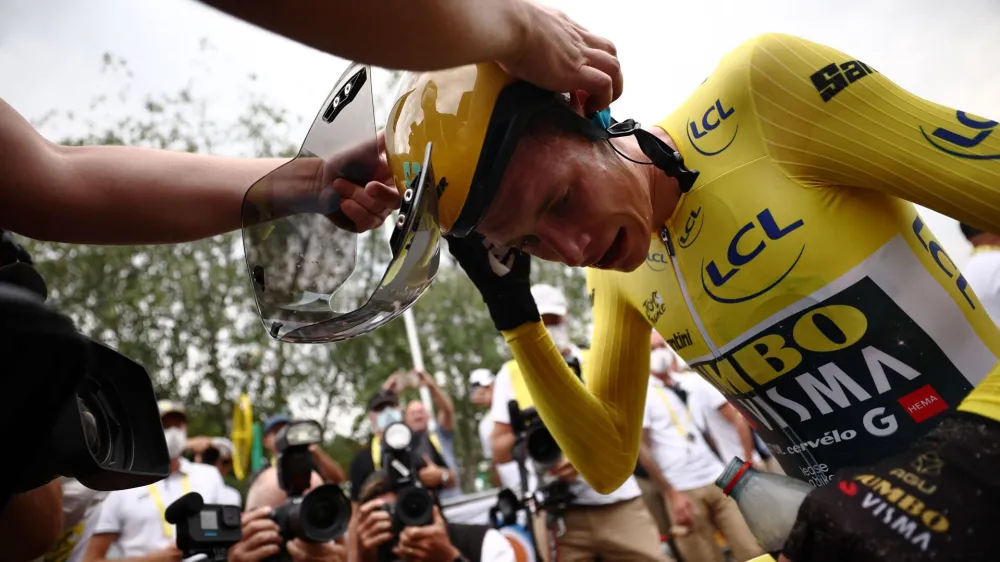 Cycling - Tour de France - Stage 16 - Passy to Combloux - France - July 18, 2023 Team Jumbo–Visma's Jonas Vingegaard wearing the yellow jersey after winning stage 16 Pool via REUTERS/Anne-Christine Poujoulat