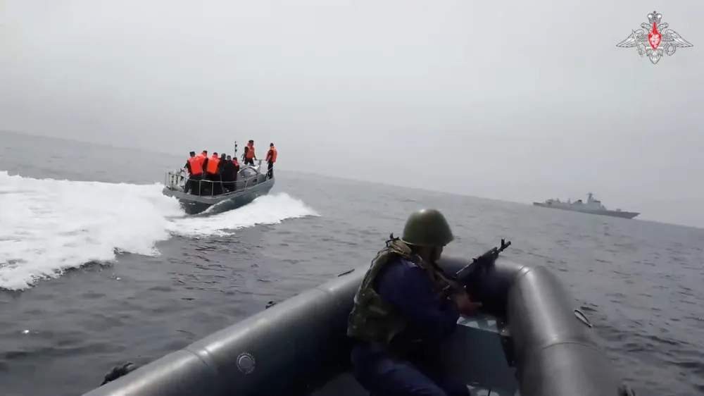 Participants sail boats during the joint Russian-Chinese naval exercise "North.Interaction - 2023" in the waters of the Sea of Japan, in this still image taken from video released July 20, 2023. Russian Defence Ministry/Handout via REUTERS ATTENTION EDITORS - THIS IMAGE WAS PROVIDED BY A THIRD PARTY. NO RESALES. NO ARCHIVES. MANDATORY CREDIT.