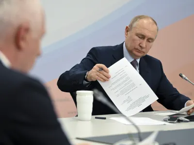 Russian President Vladimir Putin chairs a meeting on the development of restricted administrative areas and settlements in the Arctic zone, where military formations are deployed, in Severomorsk, Murmansk region, Russia, Thursday, July 20, 2023. (Ramil Sitdikov, Sputnik, Kremlin Pool Photo via AP)