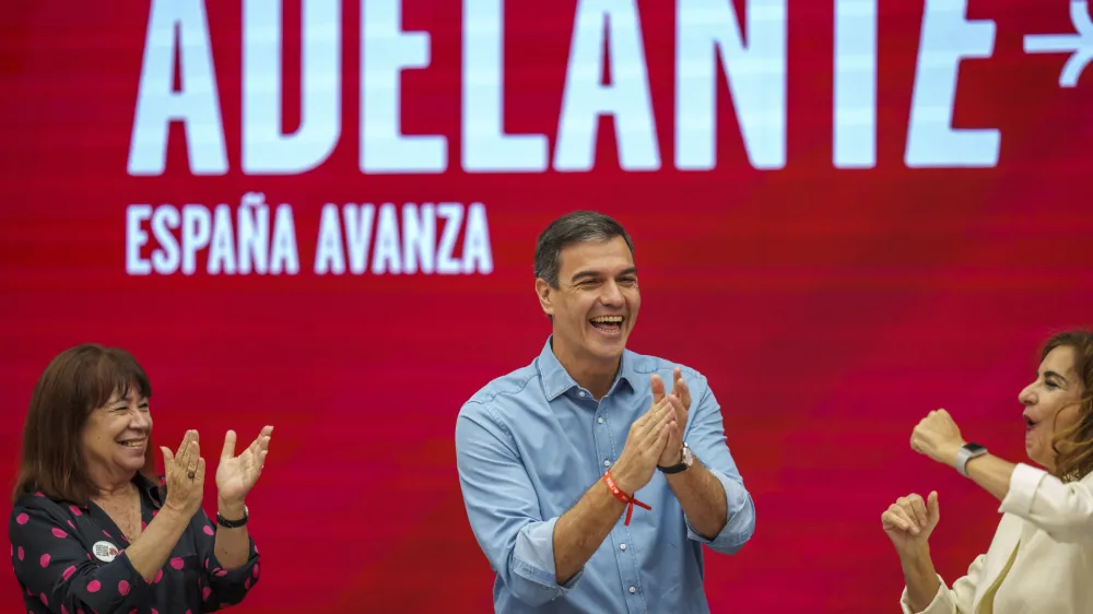 Socialist Workers' Party leader and current Prime Minister Pedro Sanchez, center, applauds during an executive committee meeting in Madrid, Spain, Monday, July 24, 2023. Spain's inconclusive national election has produced one result that will be greeted with relief in European capitals, which like Madrid firmly support the European Union. (AP Photo/Manu Fernandez)