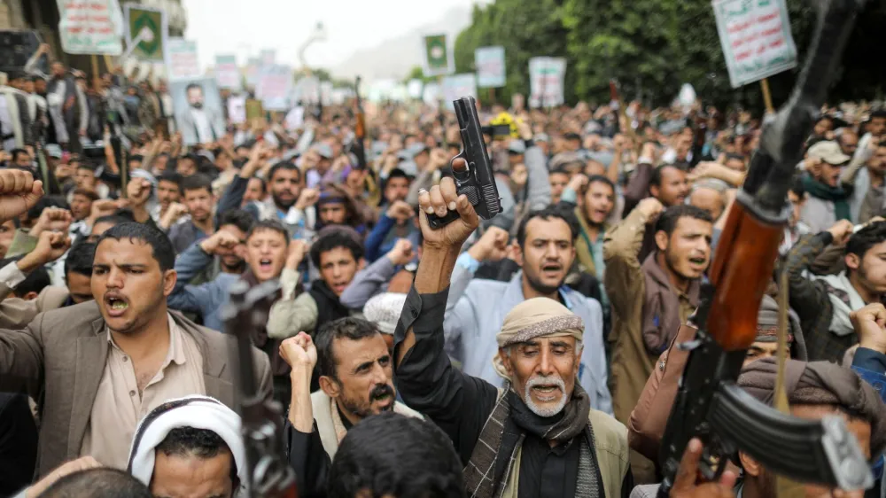 Men hold firearms as people demonstrate against the desecration of the Koran in Denmark, in Sanaa, Yemen July 24, 2023. REUTERS/Khaled Abdullah   TPX IMAGES OF THE DAY