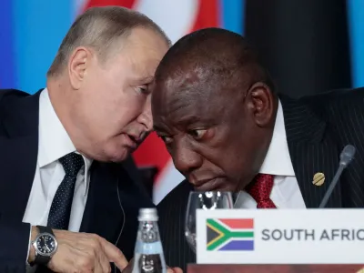 FILE PHOTO: Russia's President Vladimir Putin speaks with South African President Cyril Ramaphosa at the first plenary session as part of the 2019 Russia-Africa Summit at the Sirius Park of Science and Art in Sochi, Russia, October 24, 2019. Sergei Chirikov/Pool via REUTERS/File Photo