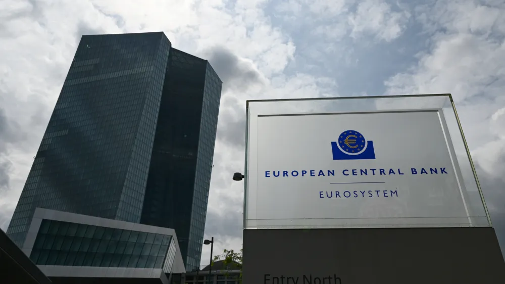 26 July 2023, Hesse, Frankfurt_Main: A stele with the inscription "European Central Bank - Eurosystem" stands in front of the European Central Bank (ECB) in the east of the banking city. Photo: Arne Dedert/dpa