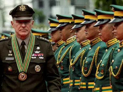 FILE PHOTO: U.S. Army Chief of Staff Gen. James McConville walks past honor guards during arrival honors at Fort Bonifacio, Taguig, Philippines, May 10, 2023. REUTER/Eloisa Lopez  TPX IMAGES OF THE DAY/File Photo