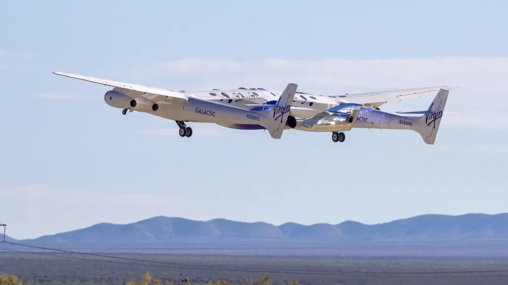 Virgin Galactic's mothership Eve, carrying the rocket-powered plane Unity 22, takes off from Spaceport America, near Truth or Consequences, N.M., Thursday, Aug. 10, 2023. Virgin Galactic is taking its first space tourists on a long-delayed rocket ship ride. (AP Photo/Andrés Leighton)