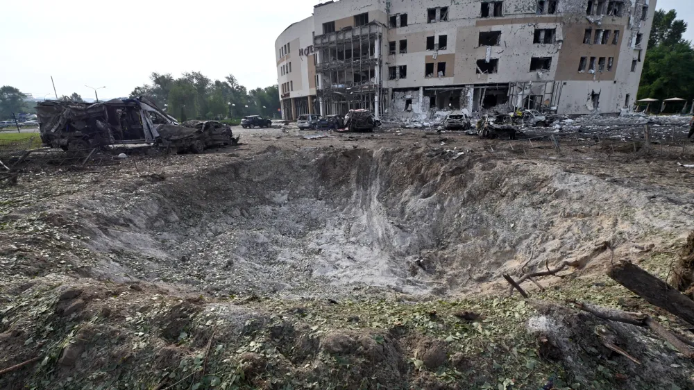 11 August 2023, Ukraine, Zaporizhzhia: The crater from a Russian missile attack is seen outside a hotel in Zaporizhzhia. Photo: -/Ukrinform/dpa