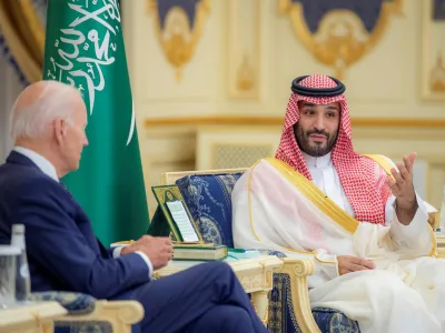 15 July 2022, Saudi Arabia, Jeddah: US President Joe Biden (L) speaks with Saudi Crown Prince Mohammed bin Salman Al Saud during their meeting at Al-Salam Palace. Photo: -/Saudi Press Agency/dpa