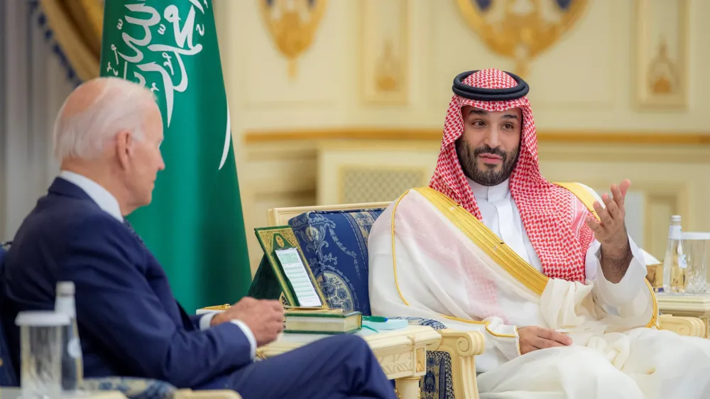 15 July 2022, Saudi Arabia, Jeddah: US President Joe Biden (L) speaks with Saudi Crown Prince Mohammed bin Salman Al Saud during their meeting at Al-Salam Palace. Photo: -/Saudi Press Agency/dpa