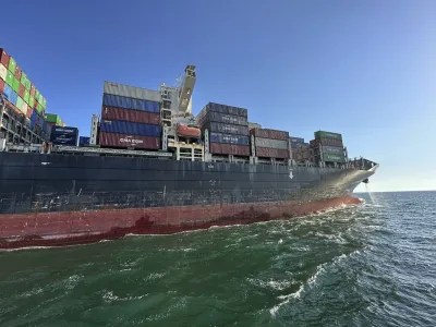 In this photo provided by Ukraine's Infrastructure Ministry Press Office, container ship Joseph Schulte (Hong Kong flag) leaves the port of Odesa to proceed through the temporary corridor established for merchant vessels from Ukraine's Black Sea ports in Odesa, Ukraine, Wednesday, Aug. 16, 2023. The ship carrying over 30 thousand tons of cargo, including food products, which had been in the port of Odesa since last February because of the Russian invasion of Ukraine, left Odessa under an agreement between Ukraine and the International Maritime Organisation. (Ukraine's Infrastructure Ministry Press Office via AP)