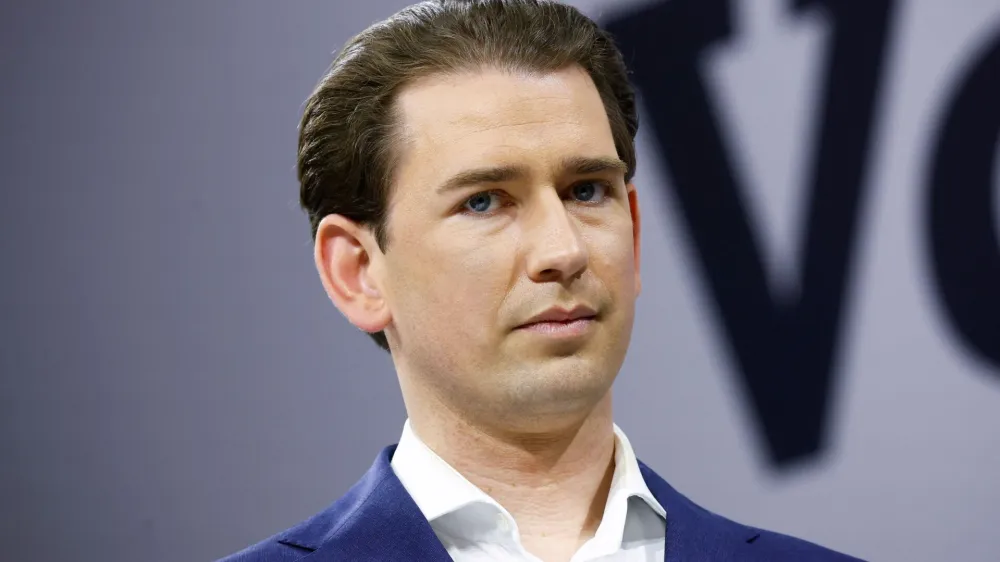 FILE PHOTO: Former Austrian Chancellor Sebastian Kurz listens as former Austrian Chancellor Wolfgang Schuessel speaks during the Austrian People's Party (OeVP) conference in Graz, Austria May 14, 2022. REUTERS/Lisa Leutner/File Photo