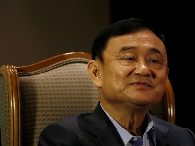 FILE PHOTO: Former Thai Prime Minister Thaksin Shinawatra looks on as he speaks to Reuters during an interview in Singapore February 23, 2016. REUTERS/Edgar Su/File Photo/File Photo