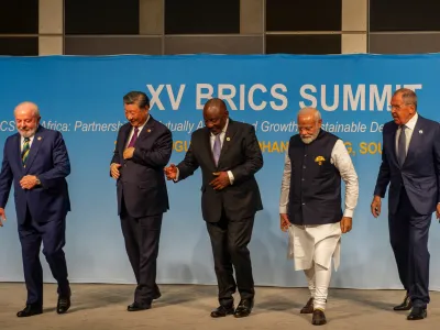 Brazil's President Luiz Inacio Lula da Silva, China's President Xi Jinping, South African President Cyril Ramaphosa, Indian Prime Minister Narendra Modi and Russia's Foreign Minister Sergei Lavrov walk after posing for a picture at the BRICS Summit in Johannesburg, South Africa August 23, 2023. REUTERS/Alet Pretorius/Pool