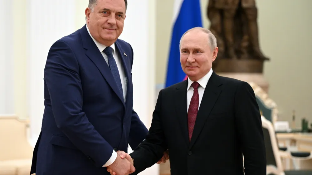 Bosnian Serb leader Milorad Dodik, left, and Russian President Vladimir Putin pose for a photo during their meeting at the Kremlin in Moscow, Russia. in Moscow, Russia, Tuesday, May 23, 2023. (Alexey Filippov, Sputnik, Kremlin Pool Photo via AP)