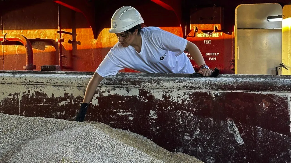 In this photo released by the United Nations, a U.N. official of the Joint Coordination Centre carries out an inspection on board of the bulk cargo ship TQ Samsun, which traveled from Odessa, Ukraine, loaded with grain, while anchored in the Black Sea, near the entrance of the Bosphorus Strait in Istanbul, Turkey, Monday, July 17, 2023. Russia on Monday halted a breakthrough wartime deal that allowed grain to flow from Ukraine to countries in Africa, the Middle East and Asia where hunger is a growing threat and high food prices have pushed more people into poverty. (United Nations via AP)