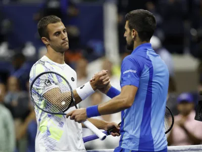 Sep 1, 2023; Flushing, NY, USA; Novak Djokovic of Serbia (R) shakes hands with Laslo Djere of Serbia (L) after their match on day five of the 2023 U.S. Open tennis tournament at USTA Billie Jean King National Tennis Center. Mandatory Credit: Geoff Burke-USA TODAY Sports