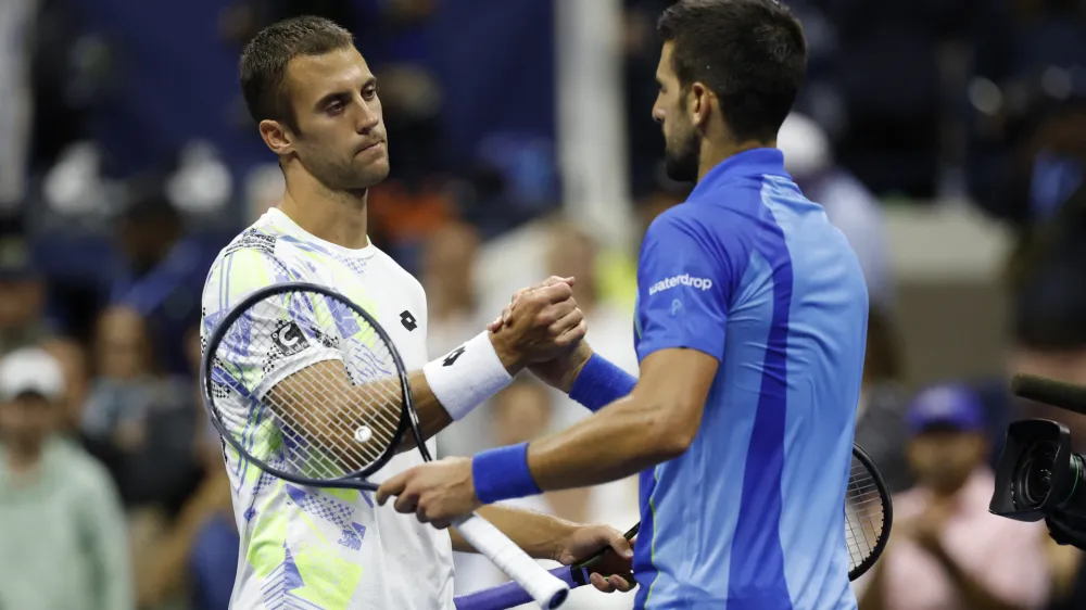 Sep 1, 2023; Flushing, NY, USA; Novak Djokovic of Serbia (R) shakes hands with Laslo Djere of Serbia (L) after their match on day five of the 2023 U.S. Open tennis tournament at USTA Billie Jean King National Tennis Center. Mandatory Credit: Geoff Burke-USA TODAY Sports