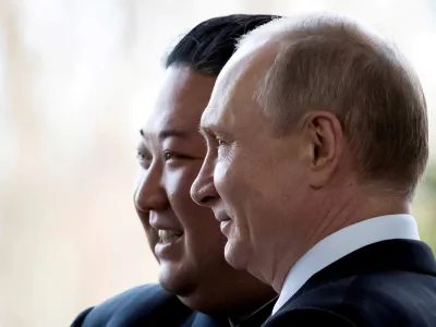 FILE PHOTO: FILE PHOTO: Russian President Vladimir Putin and North Korea's leader Kim Jong Un pose for a photo during their meeting in Vladivostok, Russia, April 25, 2019. Picture taken April 25, 2019. Alexander Zemlianichenko/Pool via REUTERS//File Photo/File Photo