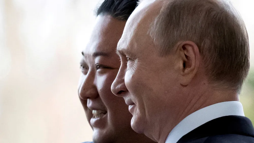 FILE PHOTO: FILE PHOTO: Russian President Vladimir Putin and North Korea's leader Kim Jong Un pose for a photo during their meeting in Vladivostok, Russia, April 25, 2019. Picture taken April 25, 2019. Alexander Zemlianichenko/Pool via REUTERS//File Photo/File Photo