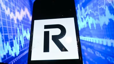 September 5, 2025, Poland: In this photo illustration, a Revolut logo is seen displayed on a smartphone with Stock market graphics on the background.,Image: 1034390709, License: Rights-managed, Restrictions:, Model Release: no