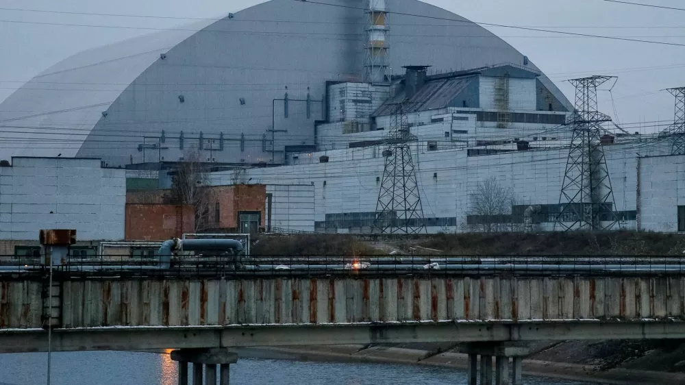 FILE PHOTO: A general view shows the New Safe Confinement (NSC) structure over the old sarcophagus covering the damaged fourth reactor at the Chernobyl Nuclear Power Plant in Chernobyl, Ukraine November 22, 2018. Picture taken November 22, 2018. REUTERS/Gleb Garanich/File Photo