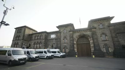 A general view of HMP Wandsworth in London where a British soldier awaiting trial on terror-related charges has escaped from a prison in southwest London Wednesday, Sept. 6, 2023 and police have launched an urgent manhunt. Counterterror police say Daniel Abed Khalife went missing from Wandsworth Prison early Wednesday. (Yui Mok/PA via AP)