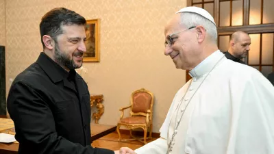 Pope Leo XIV and Ukraine's President Volodymyr Zelenskiy shake hands at Villa Barberini in Castel Gandolfo, Italy, December 9, 2025.  Vatican Media/&shy;Simone Risoluti/Handout via REUTERS  ATTENTION EDITORS - THIS IMAGE WAS PROVIDED BY A THIRD PARTY.   TPX IMAGES OF THE DAY
