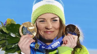 Gold medallist Slovenia's Tina Maze poses during the victory ceremony for the women's alpine skiing giant slalom event at the 2014 Sochi Winter Olympics February 19, 2014. REUTERS/Shamil Zhumatov (RUSSIA - Tags: SPORT SKIING OLYMPICS)