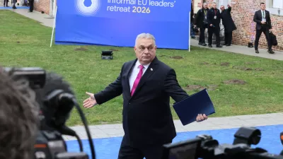 Hungary's Prime Minister Viktor Orban, center, arrives for the EU summit at Alden Biesen Castle in Bilzen-Hoeselt, Belgium, Thursday, Feb. 12, 2026. (AP Photo/Francois Walschaerts)