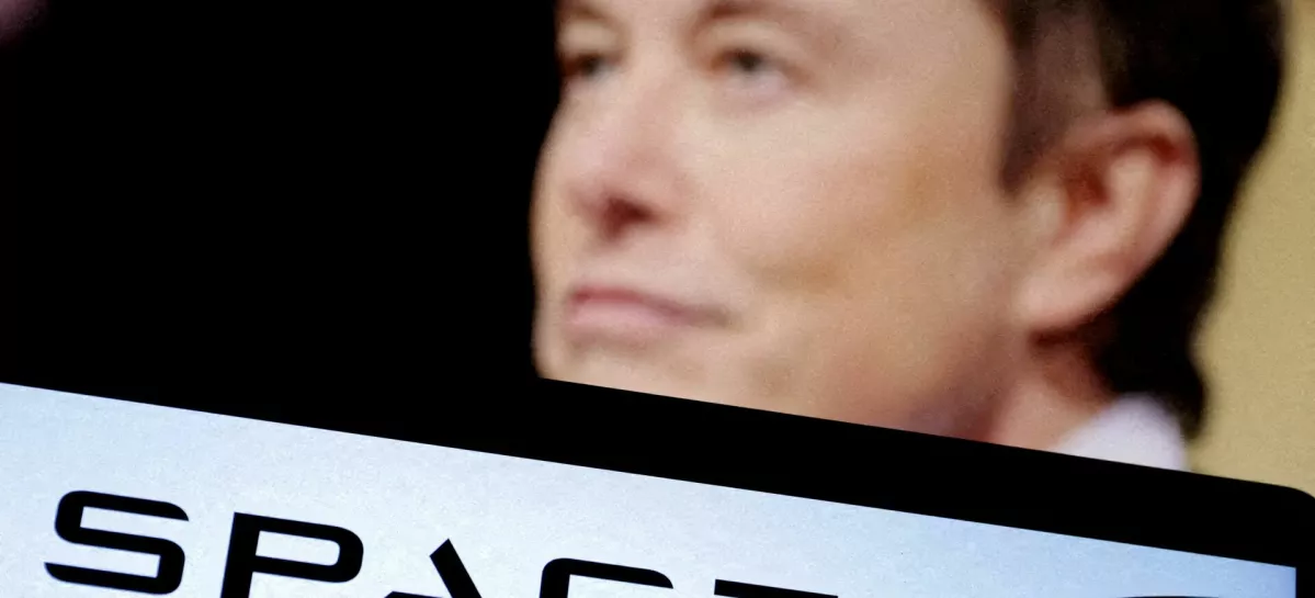 FILE PHOTO: SpaceX's logo and an Elon Musk photo are seen in this illustration created on December 19, 2022. REUTERS/Dado Ruvic/Illustration/File Photo