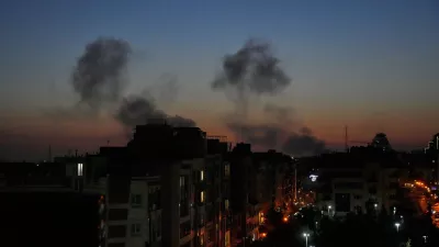 Plumes of smoke rise as strikes hit the city during the U.S.&ndash;Israeli military campaign in Tehran, Iran, Friday night, March 6, 2026. (AP Photo/Vahid Salemi)