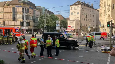 02 May 2025, Baden-W&uuml;rttemberg, Stuttgart: Police officers and emergency workers present at the scene where a car drove into people. According to police, a car has driven into a group of people in Stuttgart city center. Three people have been injured so far. The driver has been arrested, a police spokeswoman said. Photo: Marco Krefting/dpa