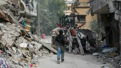 FILE PHOTO: A bulldozer works at the site of last wednesday's Israeli strike, in Tyre, Lebanon, April 10, 2026. REUTERS/Louisa Gouliamaki/File Photo