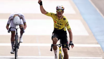 Cycling - Paris-Roubaix - Paris, France - April 12, 2026 Team Visma | Lease a Bike's Wout van Aert celebrates after crossing the finish line to win the 2026 Paris-Roubaix REUTERS/Christian Hartmann