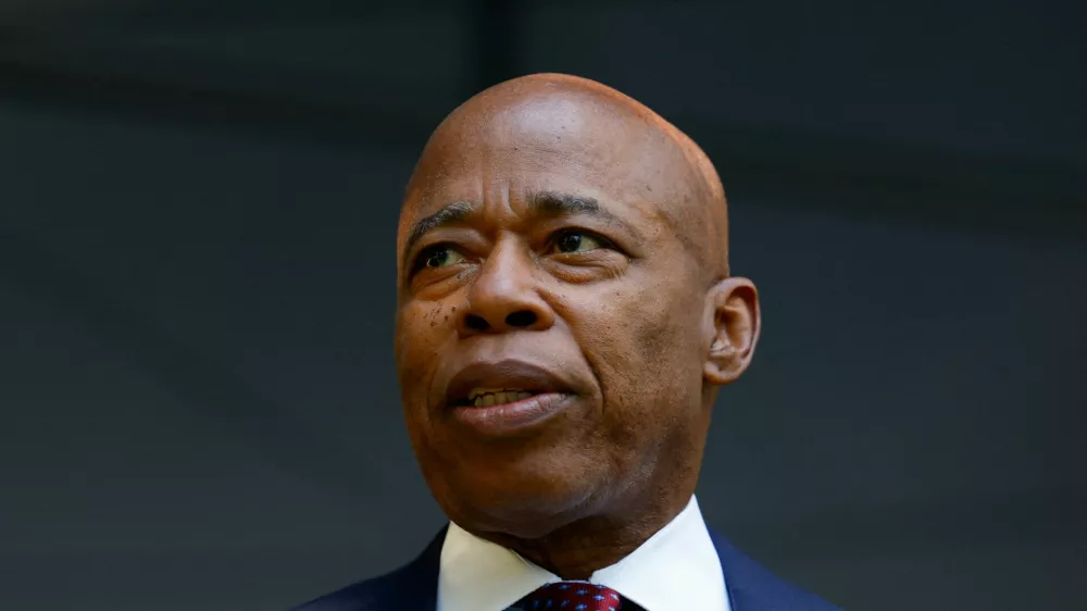 FILE PHOTO: New York Mayor Eric Adams arrives for a ceremony marking the 24th anniversary of the September 11, 2001 attacks on the World Trade Center at the 9/11 Memorial and Museum in the Manhattan borough of New York City, U.S., September 11, 2025. REUTERS/Kylie Cooper/File Photo