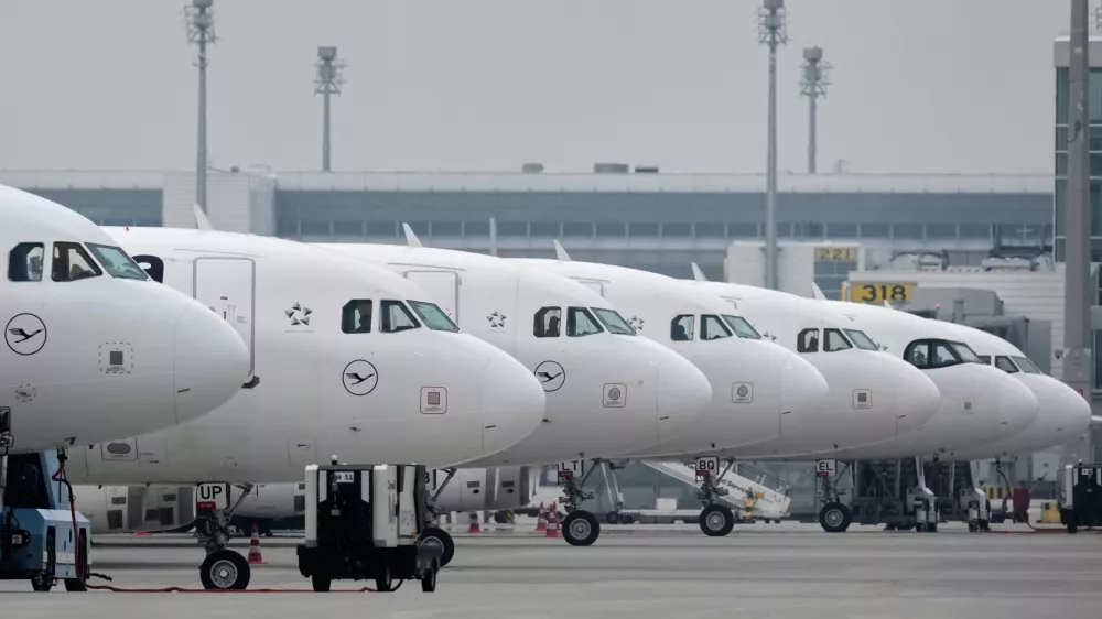 Lufthansa aircraft are parked at an airport as Lufthansa pilots are on a two-day strike in Munich, Germany, Monday, April 13, 2026. (AP Photo/Matthias Schrader)