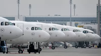 Lufthansa aircraft are parked at an airport as Lufthansa pilots are on a two-day strike in Munich, Germany, Monday, April 13, 2026. (AP Photo/Matthias Schrader)