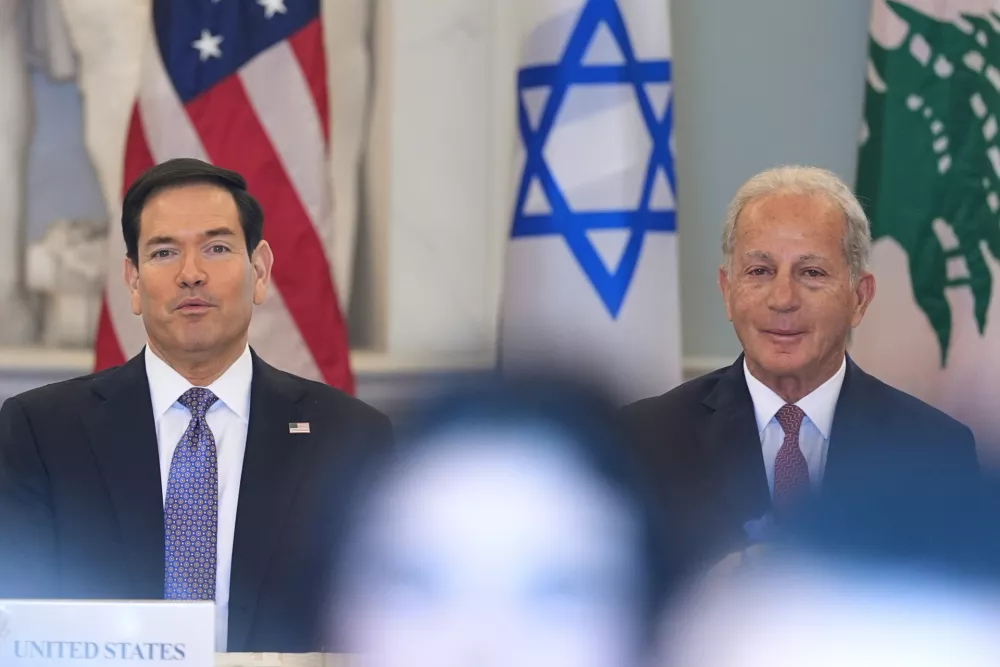 Secretary of State Marco Rubio and U.S. Ambassador to Lebanon Michel Issa sit during a meeting at the State Department in Washington, Tuesday, April 14, 2026. (AP Photo/Jacquelyn Martin)