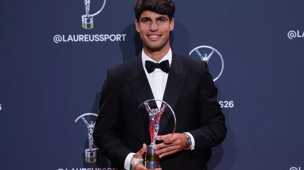 Carlos Alcaraz poses with his Laureus World Sportsman of the Year award during the 2026 Laureus World Sports Awards ceremony in Madrid, Spain, Monday, April 20, 2026. (AP Photo/Manu Fernandez)
