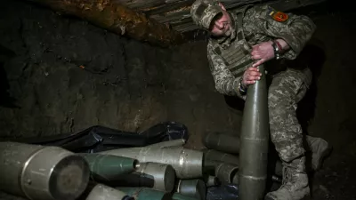 FILE PHOTO: A Ukrainian serviceman of the 260th Zaporizhzhia Separate Territorial Defence Brigade of the Ukrainian Armed Forces checks a 152-mm shell for a D‑20 howitzer before firing towards Russian troops at a frontline position, amid Russia's attack on Ukraine, in the Zaporizhzhia region, Ukraine, April 9, 2026. REUTERS/Stringer/File Photo