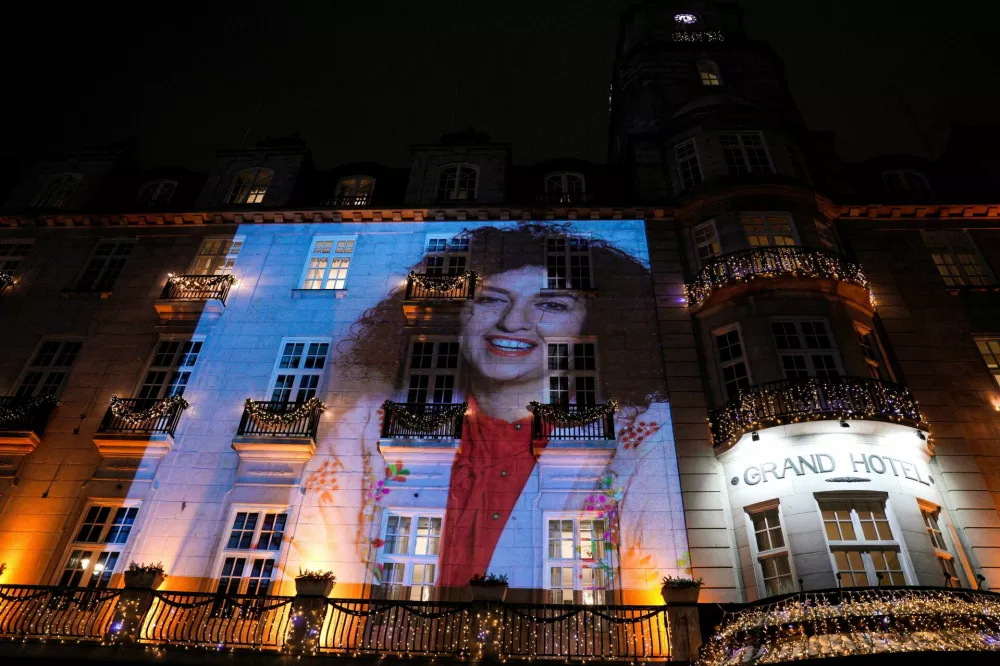 FILE PHOTO: A picture of Nobel Peace Prize winner Narges Mohammadi on the wall of the Grand Hotel in central Oslo before the Nobel banquet, in connection with the awarding of the Nobel Peace Prize 2023, in Oslo, Norway December 10, 2023. NTB/Javad Parsa via REUTERS  ATTENTION EDITORS - THIS IMAGE WAS PROVIDED BY A THIRD PARTY. NORWAY OUT. NO COMMERCIAL OR EDITORIAL SALES IN NORWAY./File Photo