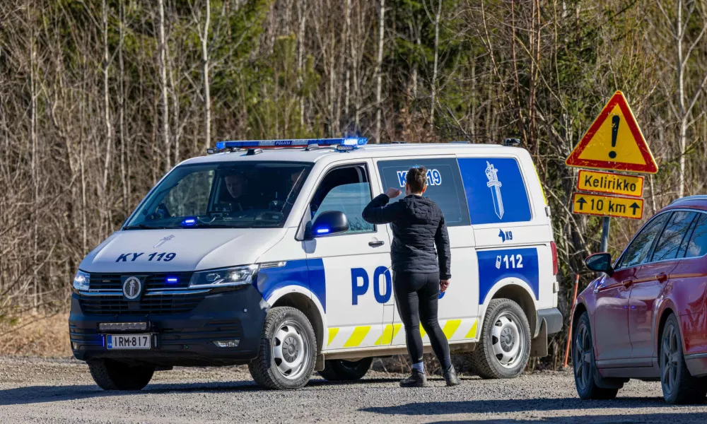 A Police car blocks the Savistontie road after two unidentified drones entered and landed in Finnish territory, in Kouvola, Finland, Sunday, March 29, 2026 (Sasu J&auml;rnstedt/Lehtikuva via AP)