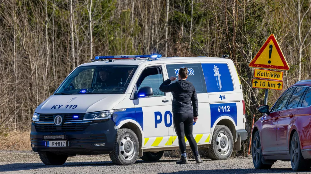 A Police car blocks the Savistontie road after two unidentified drones entered and landed in Finnish territory, in Kouvola, Finland, Sunday, March 29, 2026 (Sasu J&auml;rnstedt/Lehtikuva via AP)
