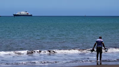 The MV Hondius cruise ship is anchored at a port in Praia, Cape Verde, Monday, May 4, 2026. (AP Photo/Arilson Almeida)