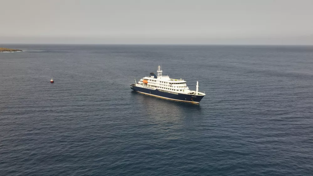 An aerial view of the MV Hondius Dutch cruise ship anchored in the Atlantic at Cape Verde, Tuesday, May 5, 2026. (AP Photo/Arilson Almeida)