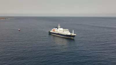An aerial view of the MV Hondius Dutch cruise ship anchored in the Atlantic at Cape Verde, Tuesday, May 5, 2026. (AP Photo/Arilson Almeida)