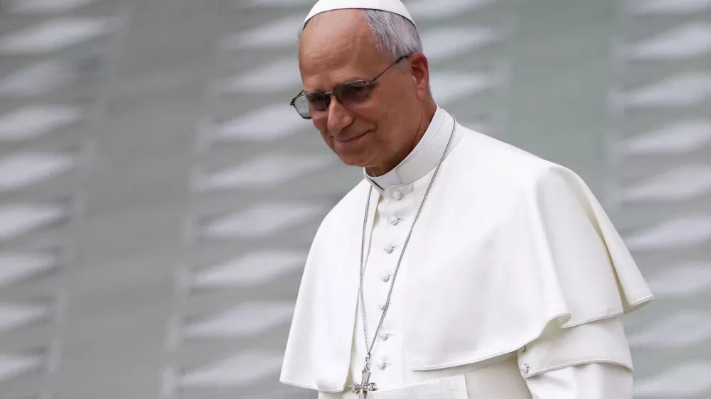 Pope Leo XIV walks after delivering his speech during the swearing-in ceremony of new Swiss Guards in the Paul VI Hall at the Vatican, May 6, 2026. REUTERS/Guglielmo Mangiapane