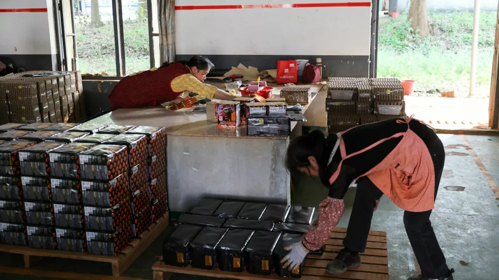 Employees work at Chili Fireworks factory in Liling, Hunan province, China, April 9, 2026. REUTERS/Go Nakamura
